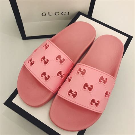 pink and purple gucci slides.